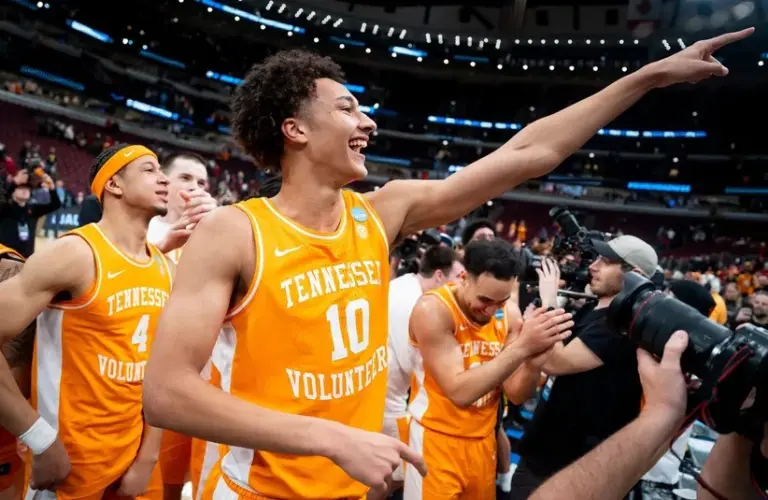 Tennessee forward Nate Ament (10) and his teammates celebrate in front of the Tennessee fan section