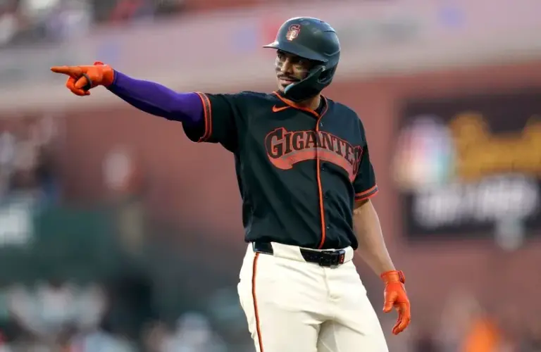San Francisco Giants shortstop Willy Adames (2) reacts after recording a hit