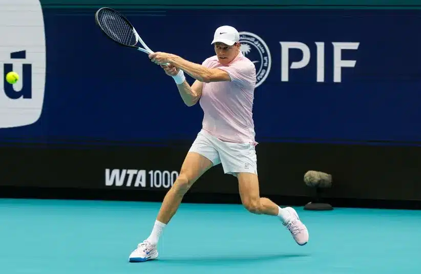 Jannik Sinner of Italy hits a backhand.