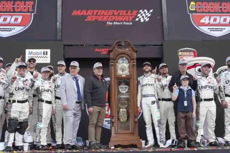 Mar 29, 2026; Martinsville, Virginia, USA; Hendrick Motorsports driver Chase Elliott (9) celebrates the win with his crew at Martinsville Speedway.