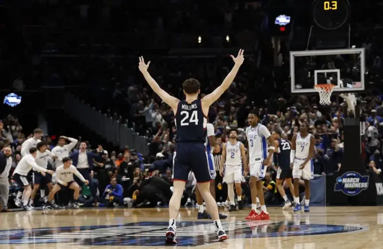 UConn Huskies guard Braylon Mullins (24) celebrates after making the game-winning three-point basket
