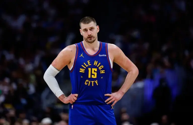 Nikola Jokic with hands on hips