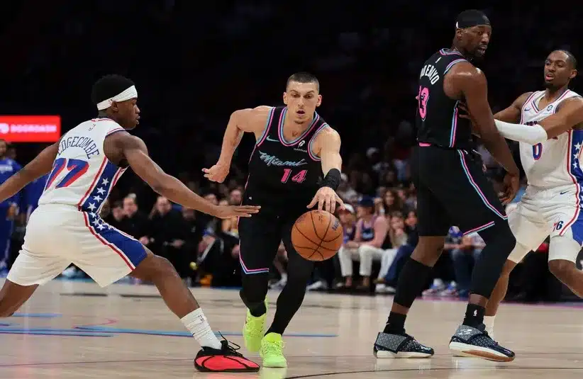 Miami Heat guard Tyler Herro (14) drives to the basket