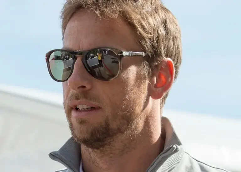 Nov 2, 2014; Austin, TX, USA; McLaren driver Jenson Button (22) of Great Britain enters the paddock prior to the 2014 U.S. Grand Prix at Circuit of the Americas.