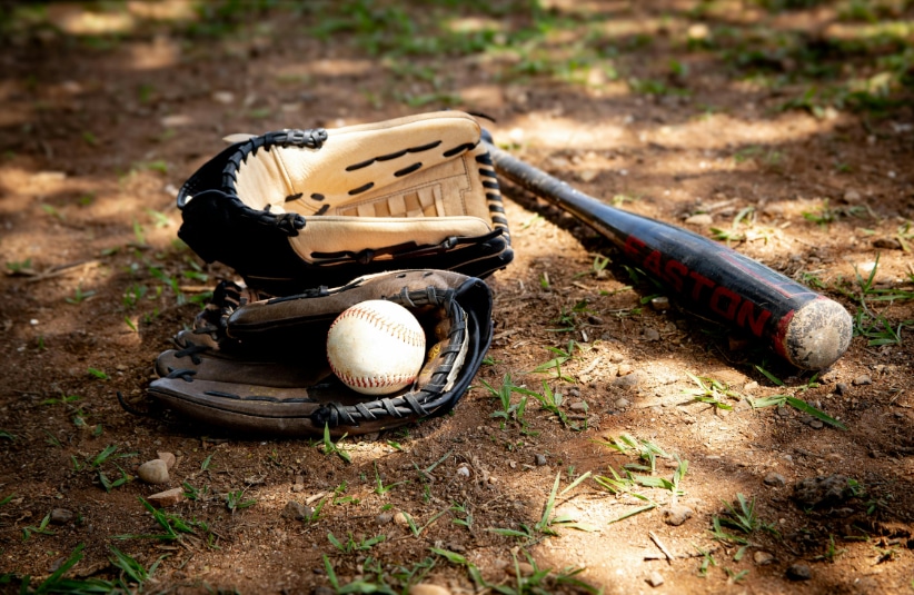 Baseball gloves, ball, and bat
