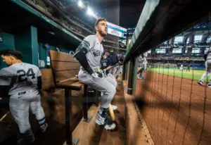 Apr 27, 2026; Arlington, Texas, USA; New York Yankees left fielder Cody Bellinger (35) sits in the dugout during the first inning of a game against the Texas Rangers at Globe Life Field.