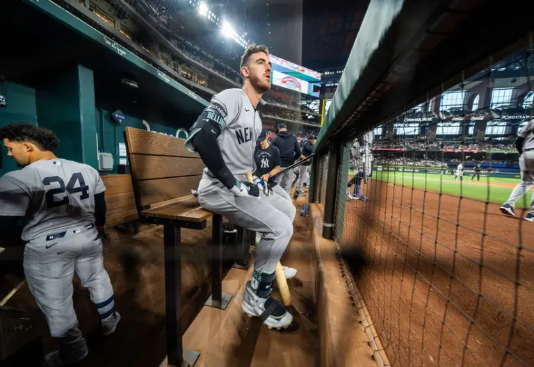 Apr 27, 2026; Arlington, Texas, USA; New York Yankees left fielder Cody Bellinger (35) sits in the dugout during the first inning of a game against the Texas Rangers at Globe Life Field.