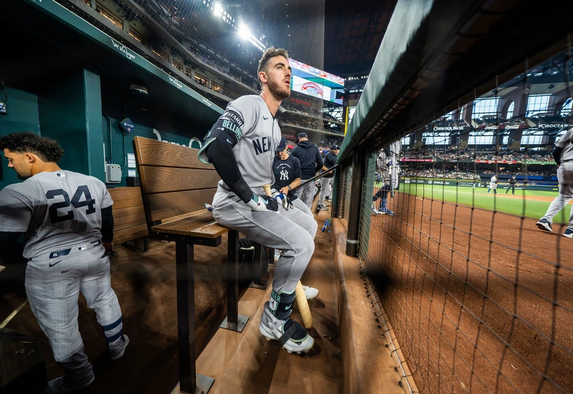 Apr 27, 2026; Arlington, Texas, USA; New York Yankees left fielder Cody Bellinger (35) sits in the dugout during the first inning of a game against the Texas Rangers at Globe Life Field.