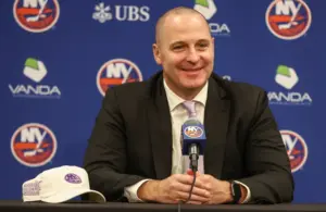 Nov 22, 2025; Elmont, New York, USA; New York Islanders General Manager Mathieu Darche speaks with fans at a pre-game event prior to the game against the St. Louis Blues at UBS Arena.