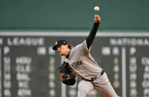Apr 22, 2026; Boston, Massachusetts, USA; New York Yankees pitcher Max Fried (54) pitches against the Boston Red Sox in the first inning at Fenway Park.