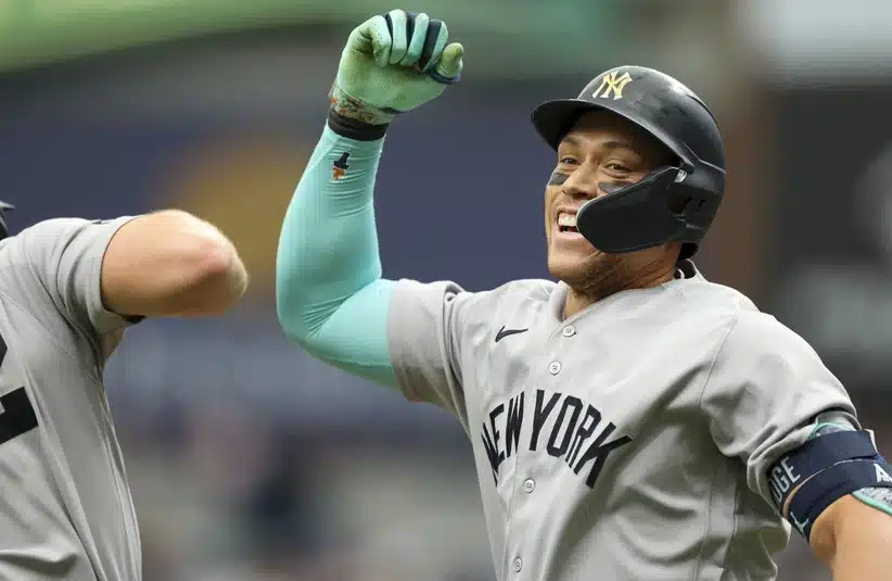 Apr 12, 2026; St. Petersburg, Florida, USA; New York Yankees designated hitter Aaron Judge (99) reacts after hitting a two run home run against the Tampa Bay Rays in the ninth inning at Tropicana Field.