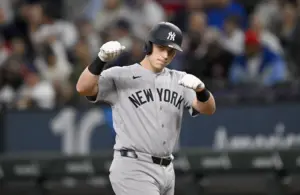 Apr 29, 2026; Arlington, Texas, USA; New York Yankees first baseman Ben Rice (22) hits a single against the Texas Rangers during the first inning at Globe Life Field.