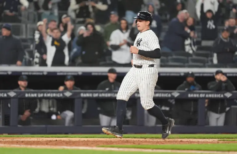 Apr 4, 2026; Bronx, New York, USA; New York Yankees first baseman Ben Rice (22) scores a run on a passed ball during the eighth inning against the Miami Marlins at Yankee Stadium.