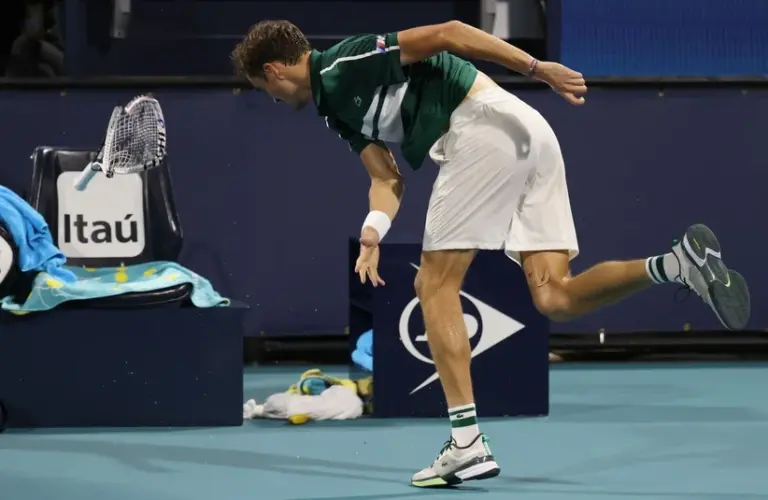 Medvedev smashing his tennis racket