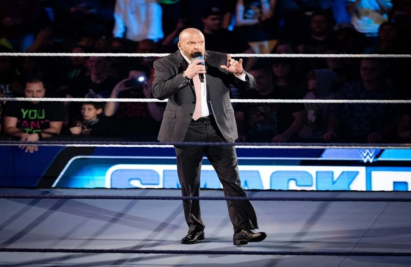 Triple H informing the WWE audience