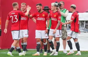 Bruno Fernandes celebrating with his team mates.