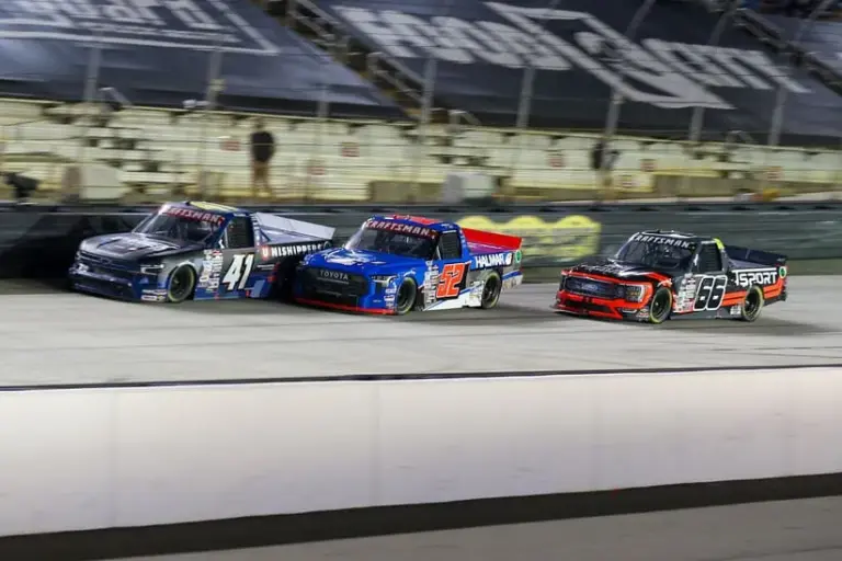 Sep 14, 2023; Bristol, Tennessee, USA; NASCAR Truck Series driver Bayley Currey (41) leads driver Stewart Friesen (52) and driver Conner Jones (66) during the NASCAR Craftsman Truck Series race at Bristol Motor Speedway.