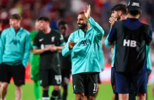 Mohamed Salah waving to the Liverpool fans