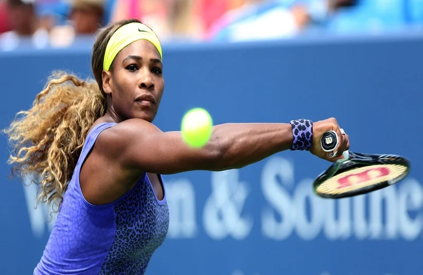 Serena Williams attempting a backhand volley