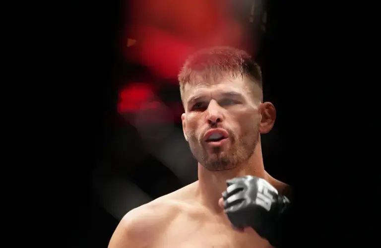 Tim Means (red gloves) before a fight against Court McGee.
