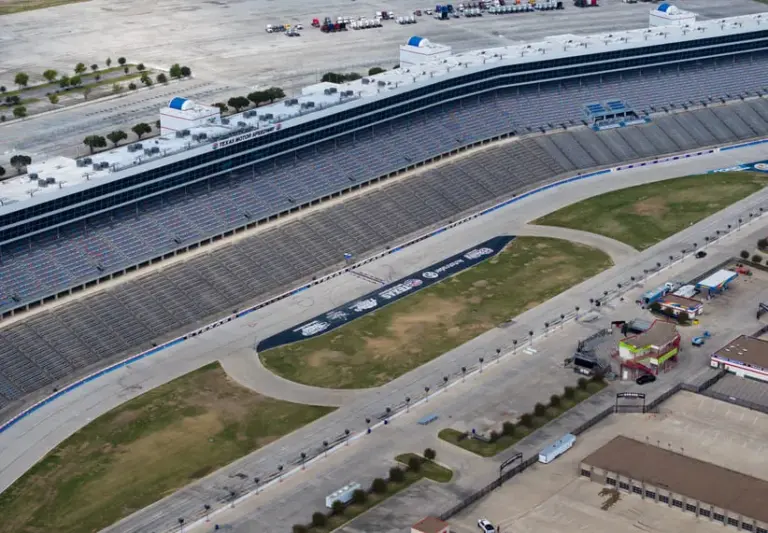 Oct 11, 2024; Fort Worth, TX, USA; Aerial overall view of the start finish line in the quad oval of the NASCAR oval track at Texas Motor Speedway.