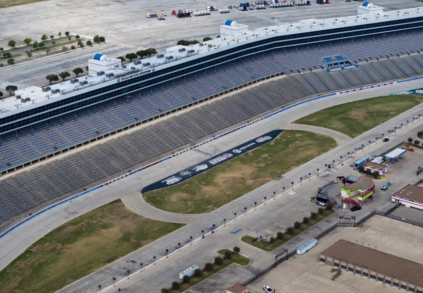 Oct 11, 2024; Fort Worth, TX, USA; Aerial overall view of the start finish line in the quad oval of the NASCAR oval track at Texas Motor Speedway.
