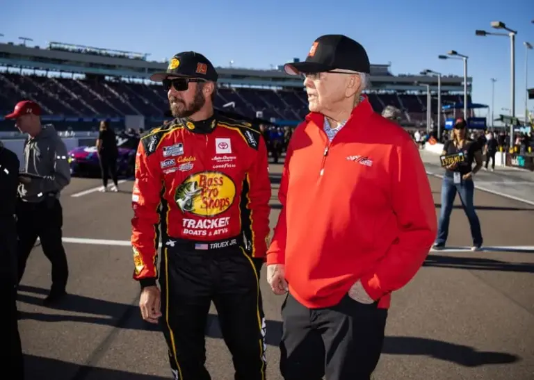 Joe Gibbs Racing; Nov 9, 2024; Avondale, Arizona, USA; NASCAR Cup Series driver Martin Truex Jr (left) with team owner Joe Gibbs during qualifying for the Championship race at Phoenix Raceway.