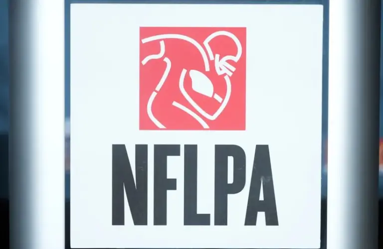 The NFLPA logo at press conference at the Super Bowl LIX media center.