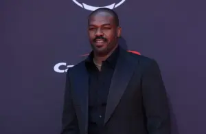 Jon Jones poses on the ESPYs red carpet at the Dolby Theatre.