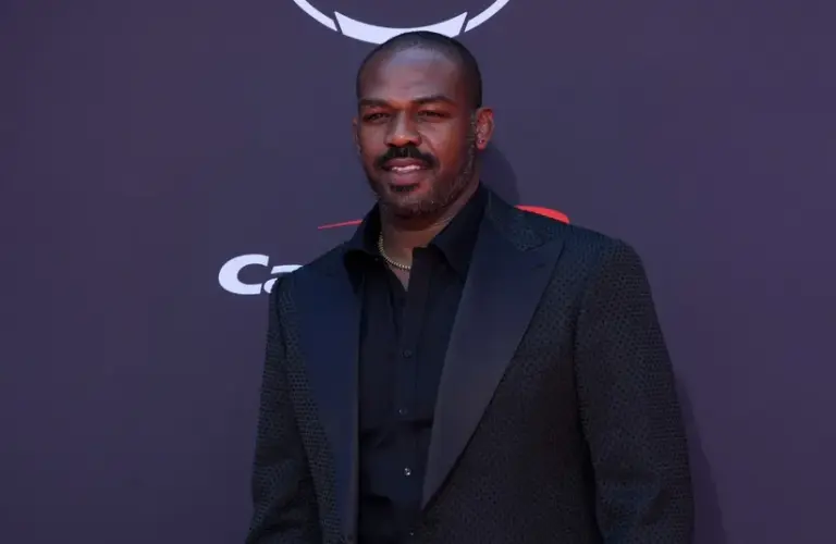 Jon Jones poses on the ESPYs red carpet at the Dolby Theatre.