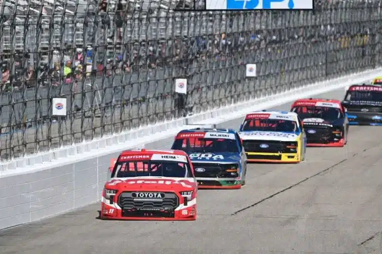 Rockingham; Sep 20, 2025; Loudon, New Hampshire, USA; NASCAR Craftsman Truck Series driver Corey Heim (11) leads a pack of trucks during the Team EJP 175 at New Hampshire Motor Speedway
