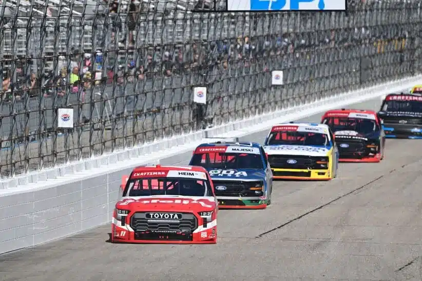 Rockingham; Sep 20, 2025; Loudon, New Hampshire, USA; NASCAR Craftsman Truck Series driver Corey Heim (11) leads a pack of trucks during the Team EJP 175 at New Hampshire Motor Speedway