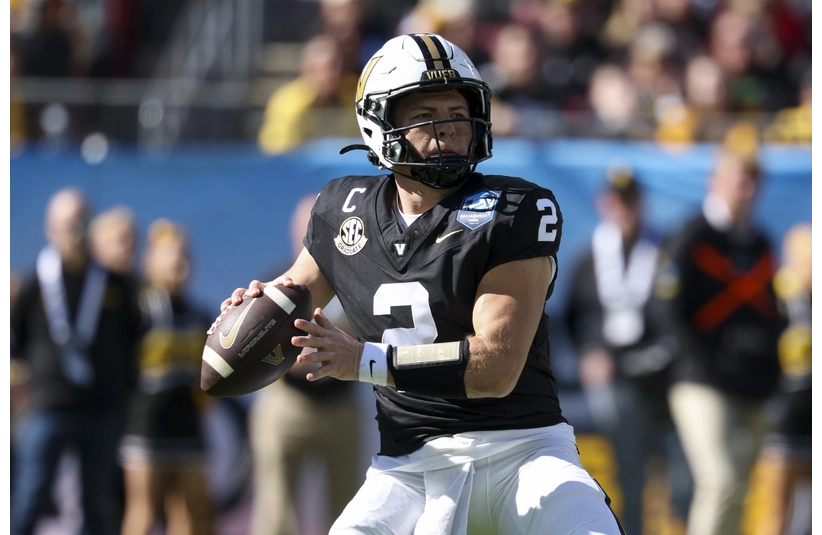 Dec 31, 2025; Tampa, FL, USA; Vanderbilt Commodores quarterback Diego Pavia (2) throws a pass against the Iowa Hawkeyes in the first quarter during the ReliaQuest Bowl at Raymond James Stadium. Mandatory Credit: Nathan Ray Seebeck-Imagn Images