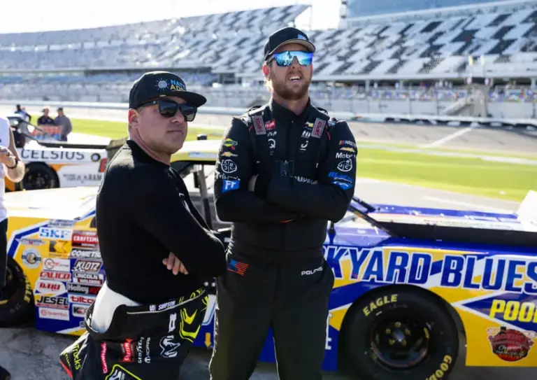McFarland; Feb 13, 2026; Daytona Beach, Florida, USA; NASCAR Truck Series driver Tony Stewart (left) with Garrett Mitchell during qualifying for the Fresh from Florida 250 at Daytona International Speedway.