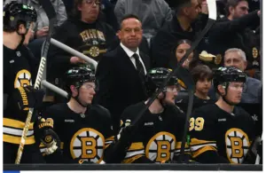 Marco Sturm behind the Bruins bench