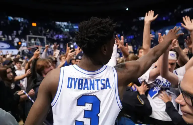 BYU Cougars forward and NBA prospect AJ Dybantsa (3) celebrates with fans after a win over the Texas Tech Red Raiders.