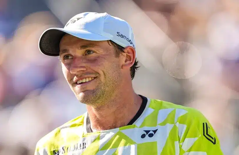 Casper Ruud smiles after a point.