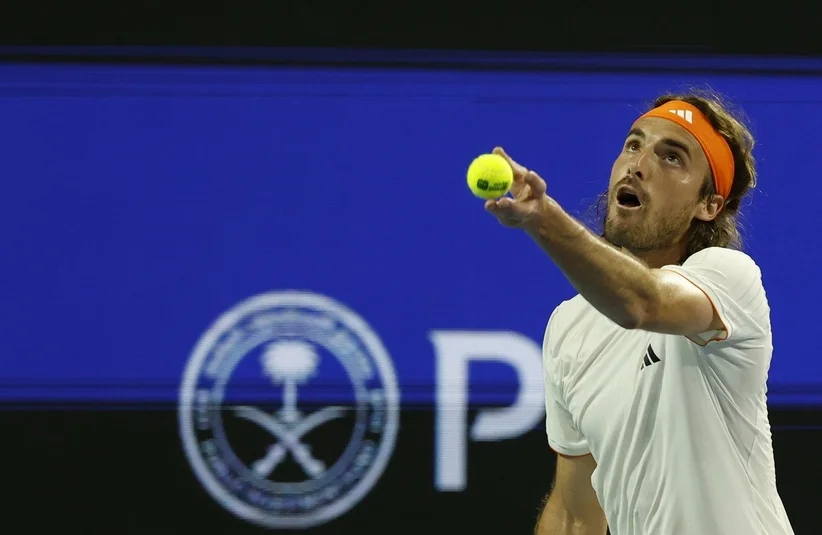 Stefanos Tsitsipas preparing a serve