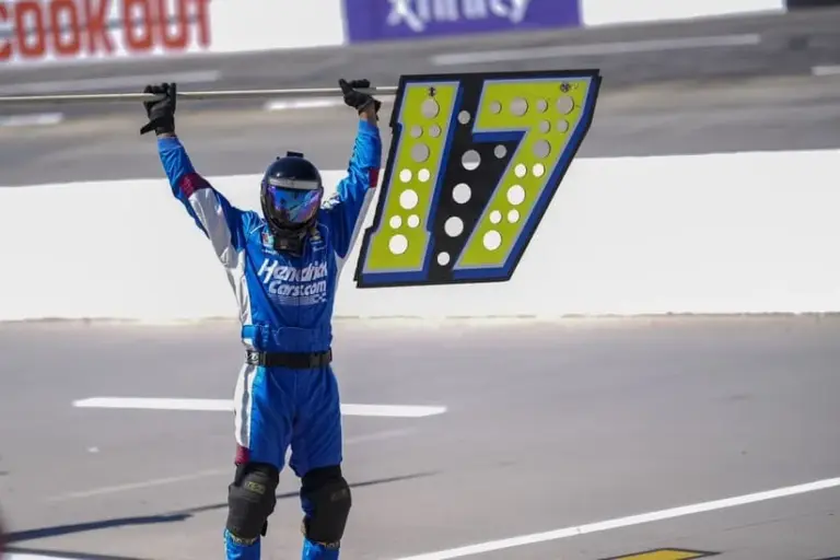 Mar 28, 2026; Martinsville, Virginia, USA; Hendrick Motorsports driver Corey Day (17) pit crew member stretches out before the start during the race at Martinsville Speedway.