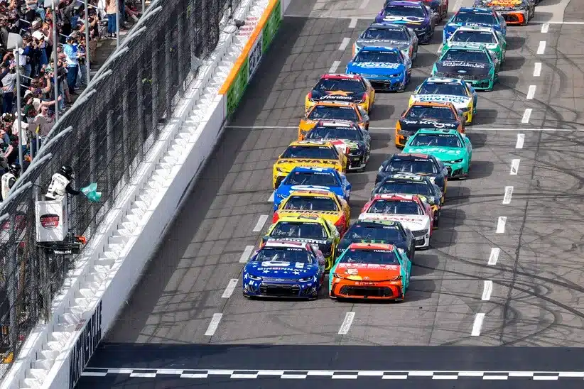 Fastest Lap; Mar 29, 2026; Martinsville, Virginia, USA; Joe Gibbs Racing driver Denny Hamlin (11) and driver William Byron (24) lead the field on a restart at Martinsville Speedway