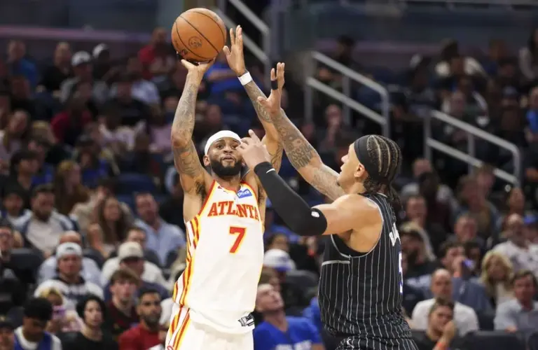 Atlanta Hawks guard Nickeil Alexander-Walker (7) shoots the ball.