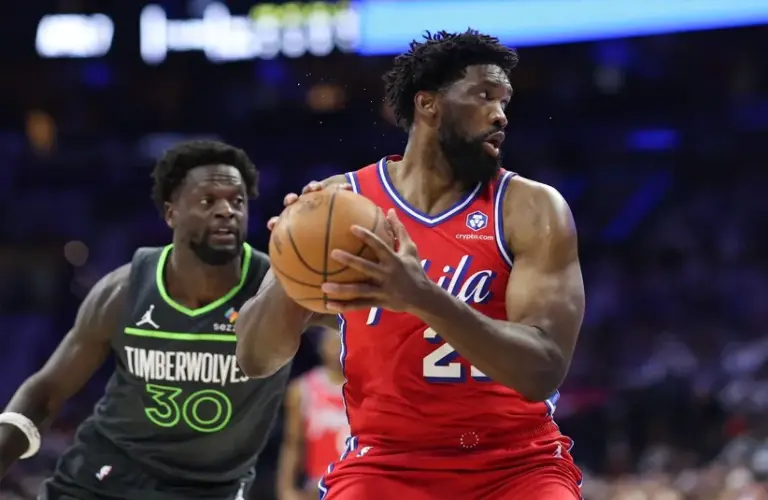 Philadelphia 76ers center Joel Embiid (21) rebounds the ball.