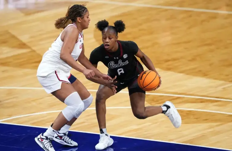 South Carolina Gamecocks forward Joyce Edwards (8) controls the ball against UConn Huskies forward Sarah Strong (21).