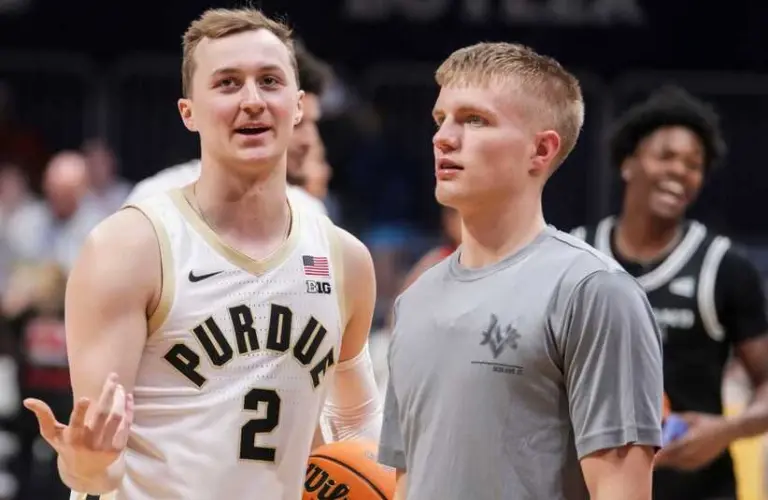 Purdue senior Fletcher Loyer talking to incoming freshman Luke Ertel.