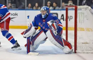 New York Rangers goalie Jonathan Quick (32) defends the net.
