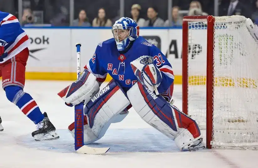 New York Rangers goalie Jonathan Quick (32) defends the net.
