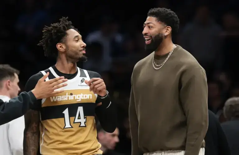 Washington Wizards forward Anthony Davis (23) talks with forward Leaky Black (14).