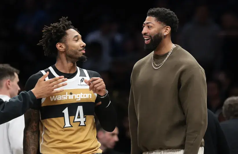 Washington Wizards forward Anthony Davis (23) talks with forward Leaky Black (14).