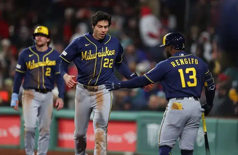 Milwaukee Brewers left fielder Christian Yelich (22) celebrates.