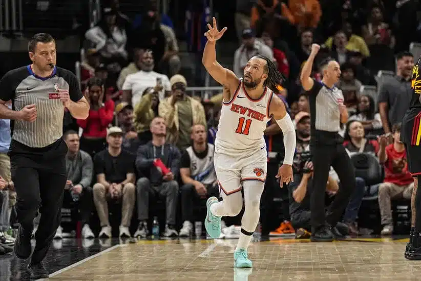 Apr 6, 2026; Atlanta, Georgia, USA; New York Knicks guard Jalen Brunson (11) reacts after making a three point shot against the Atlanta Hawks during the second half at State